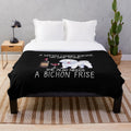 Bichon Frise dog on a plush blanket with a wine glass design