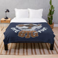 Cozy plush blanket featuring a bigfoot or sasquatch design