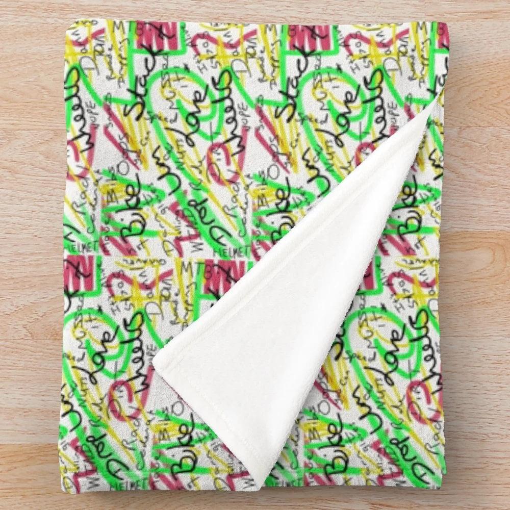 Plush bicycle-themed blanket with scribble art design