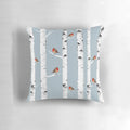 A snowy forest scene featuring birch trees and a robin bird, perfect for nature lovers