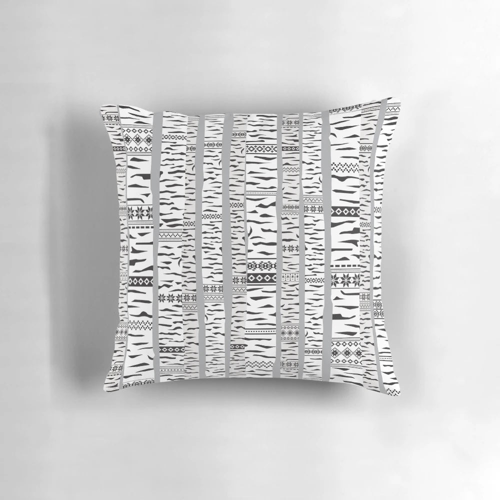 Serene black and white image of a birch forest, designed as a cozy, modern throw pillow.