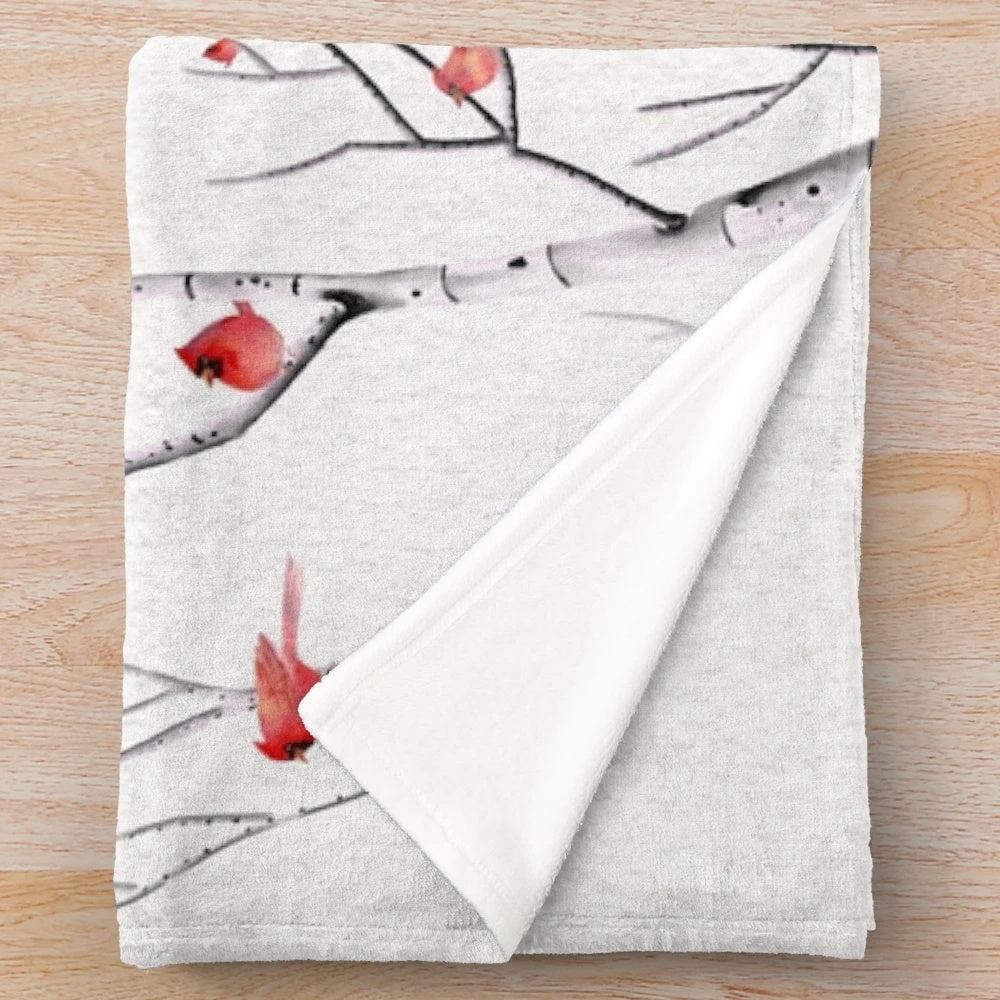 Birch tree and cardinal plush blanket with a nature-inspired design