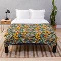 Plush blanket featuring a whimsical design of various colorful birds