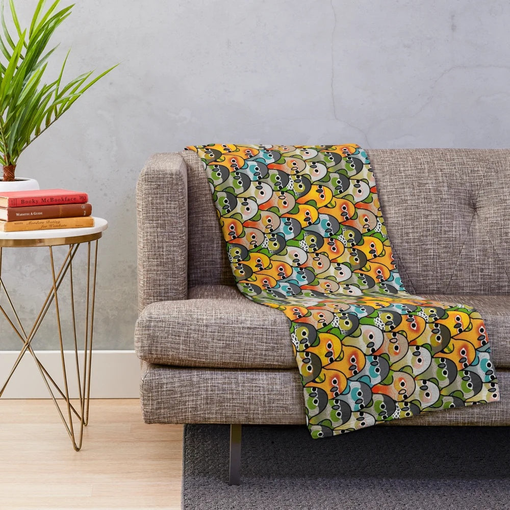 Plush blanket featuring a whimsical design of various colorful birds