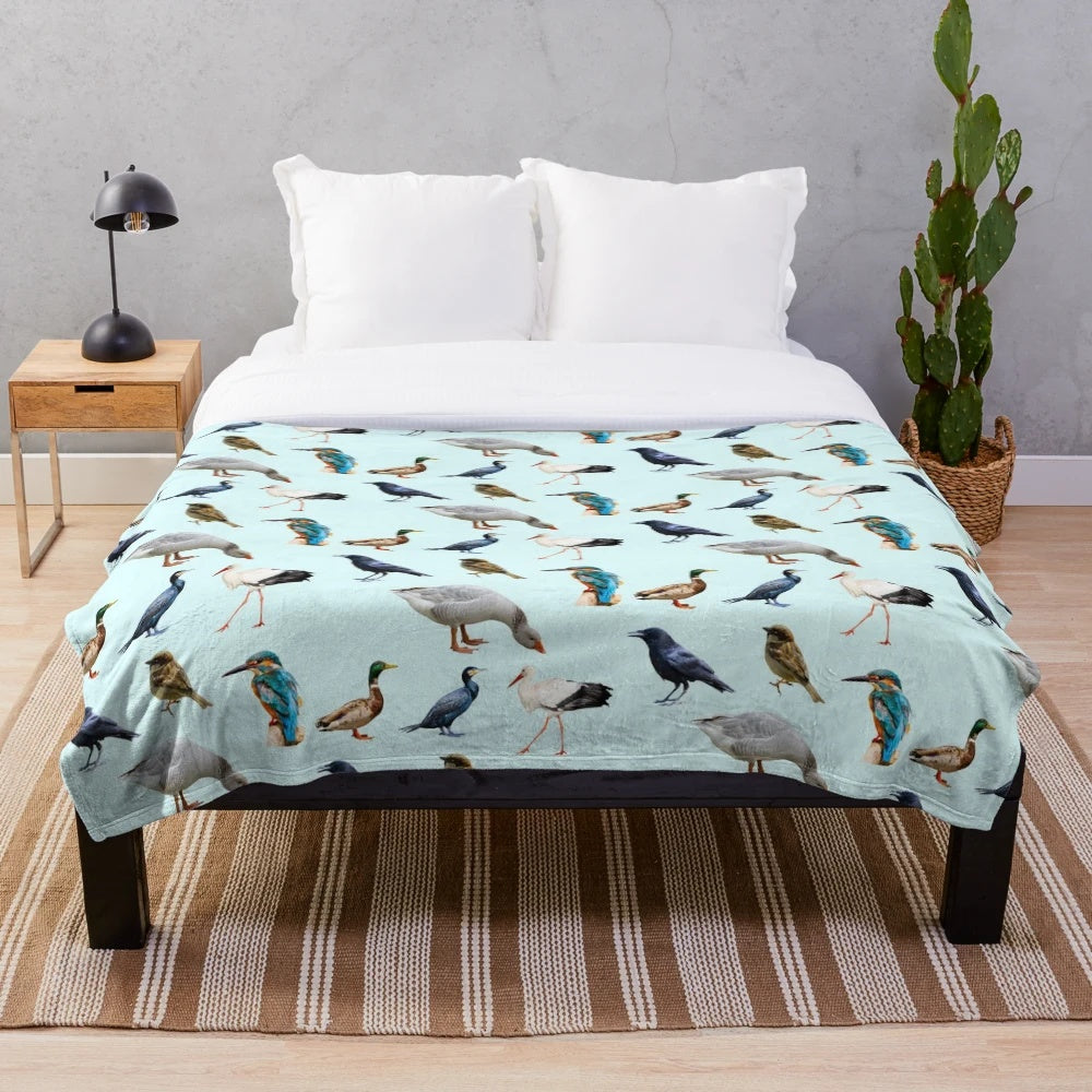 Soft and cozy plush blanket featuring a beautiful bird design