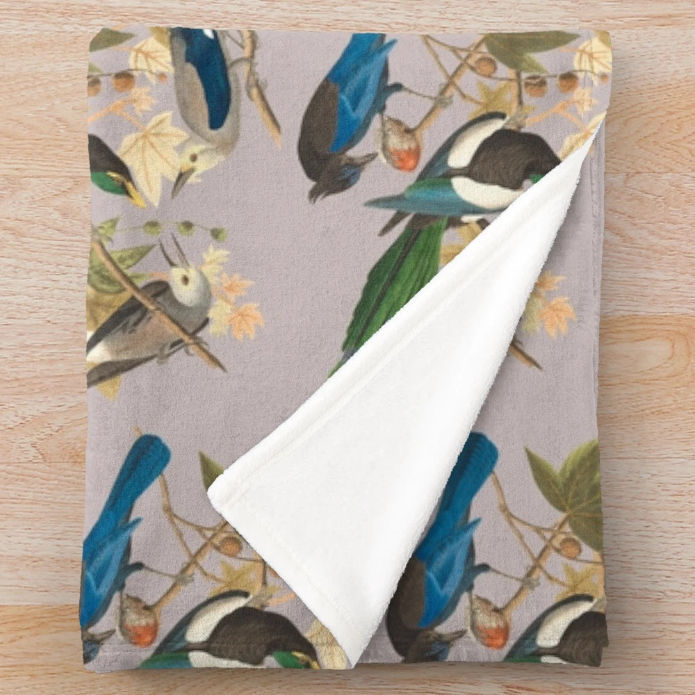 Cozy birds family plush blanket featuring a soft, comfy design