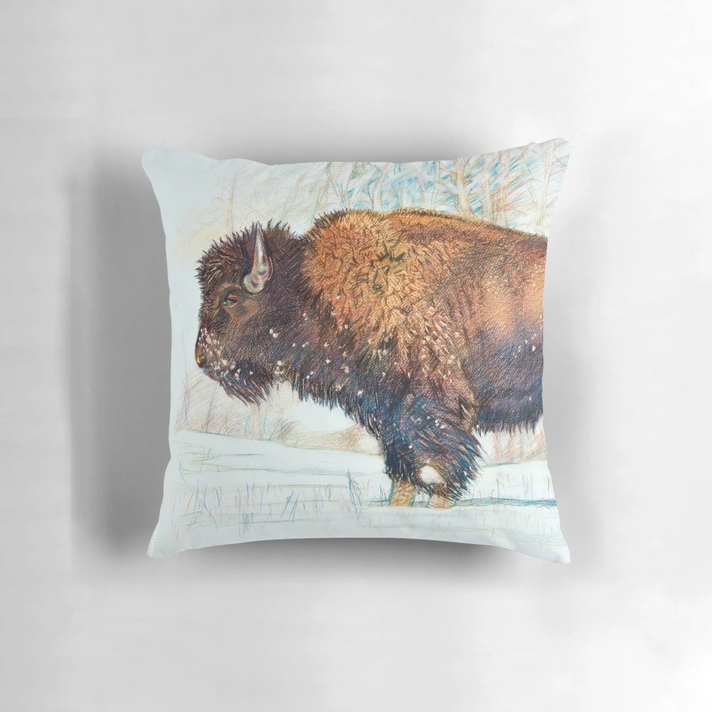 Closeup of a soft, plush bison pillow with a nature and wildlife design.