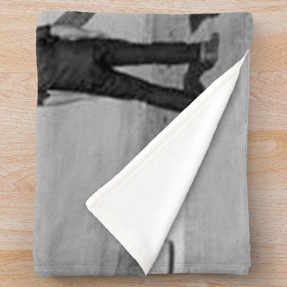 Black and white plush blanket with The Maine "Looking Up" design