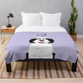Black and white sheepadoodle dog printed on a soft lilac plush blanket