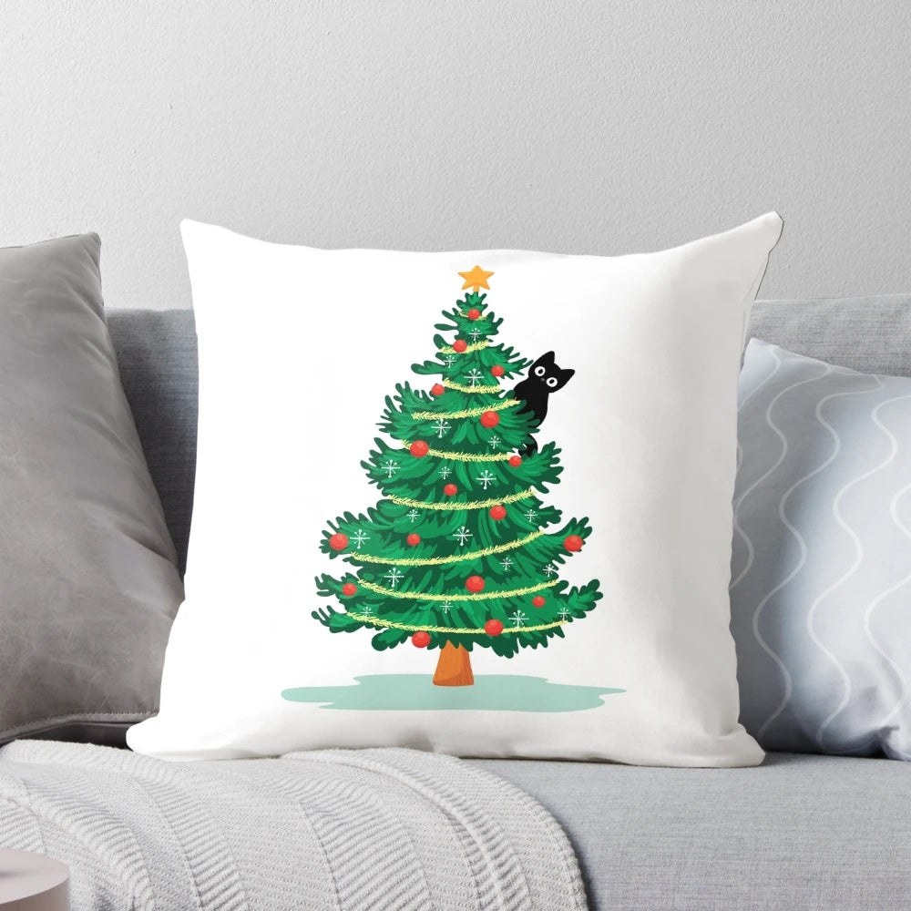 Soft, fluffy black cat nestled in a Christmas tree on a decorative pillow