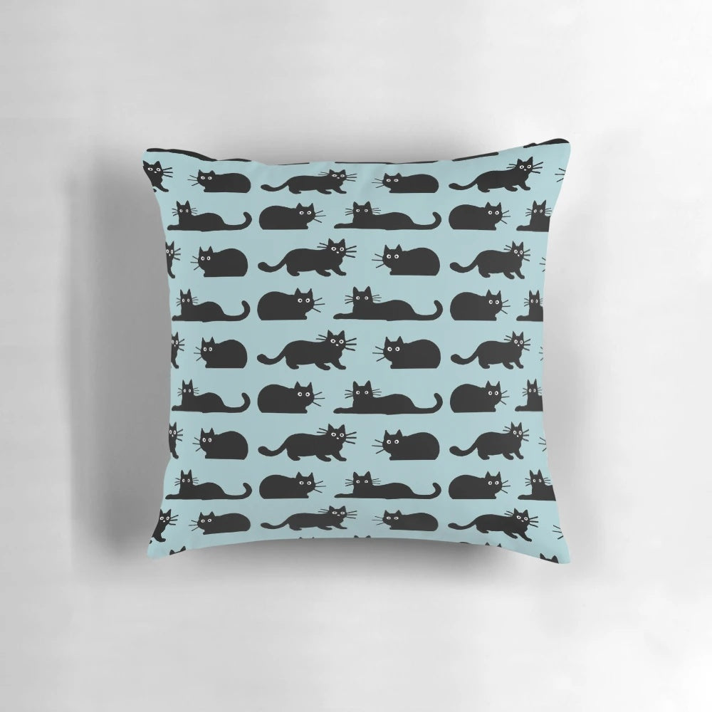 Soft, plush black cat pillow with detailed features