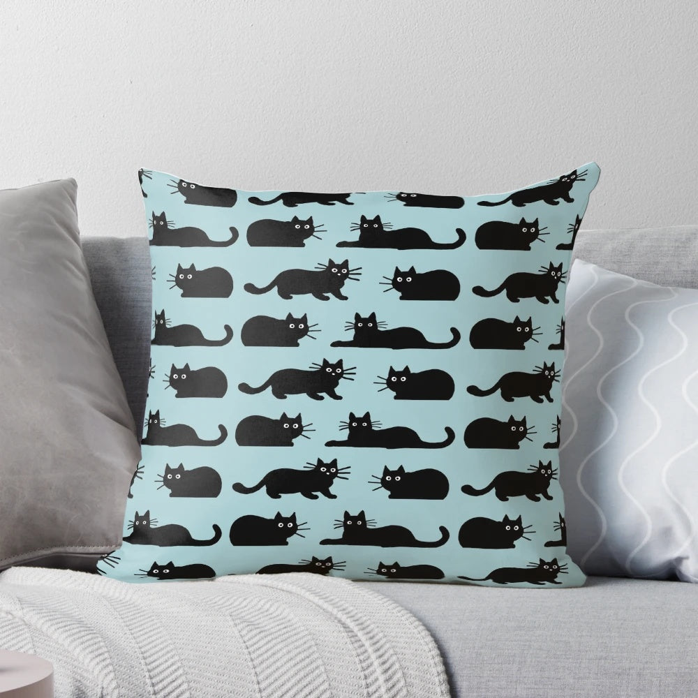 Soft, plush black cat pillow with detailed features