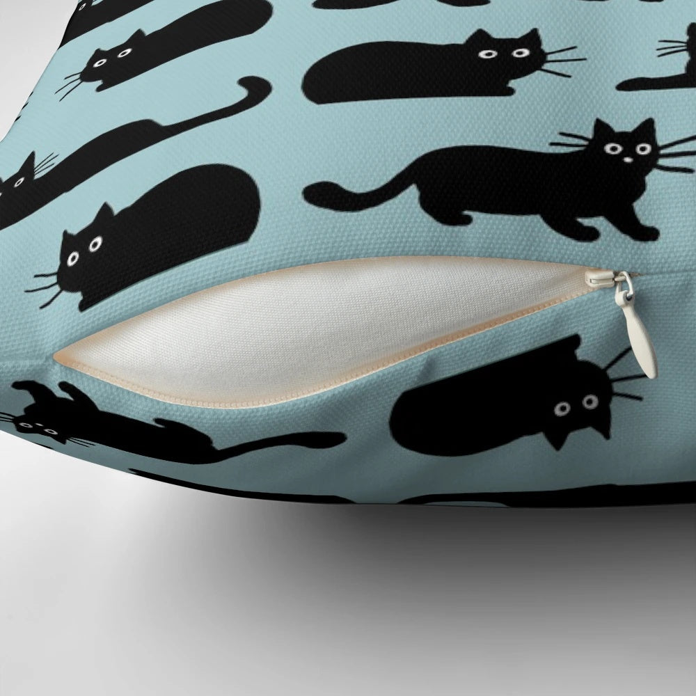 Soft, plush black cat pillow with detailed features