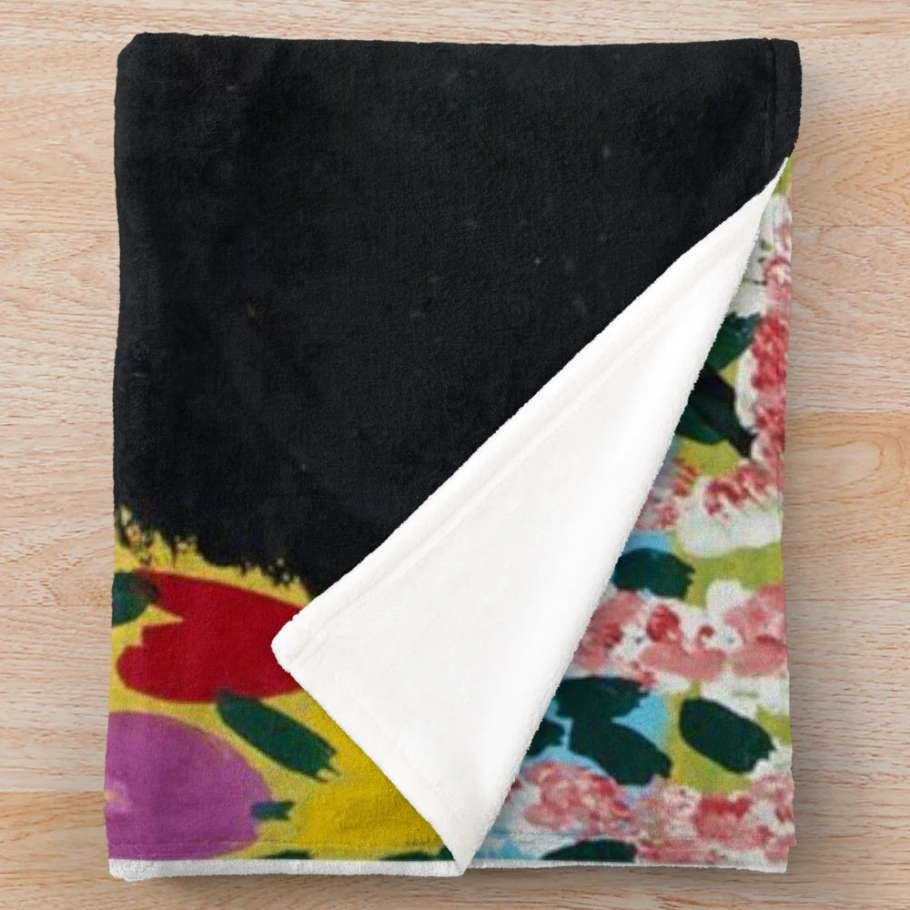 Plush black cat throw blanket featuring Maud Lewis inspired cat artwork