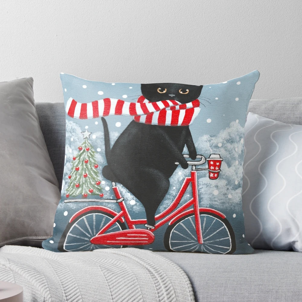 A black cat wearing a hat, riding a bicycle on a winter landscape with a Christmas tree.