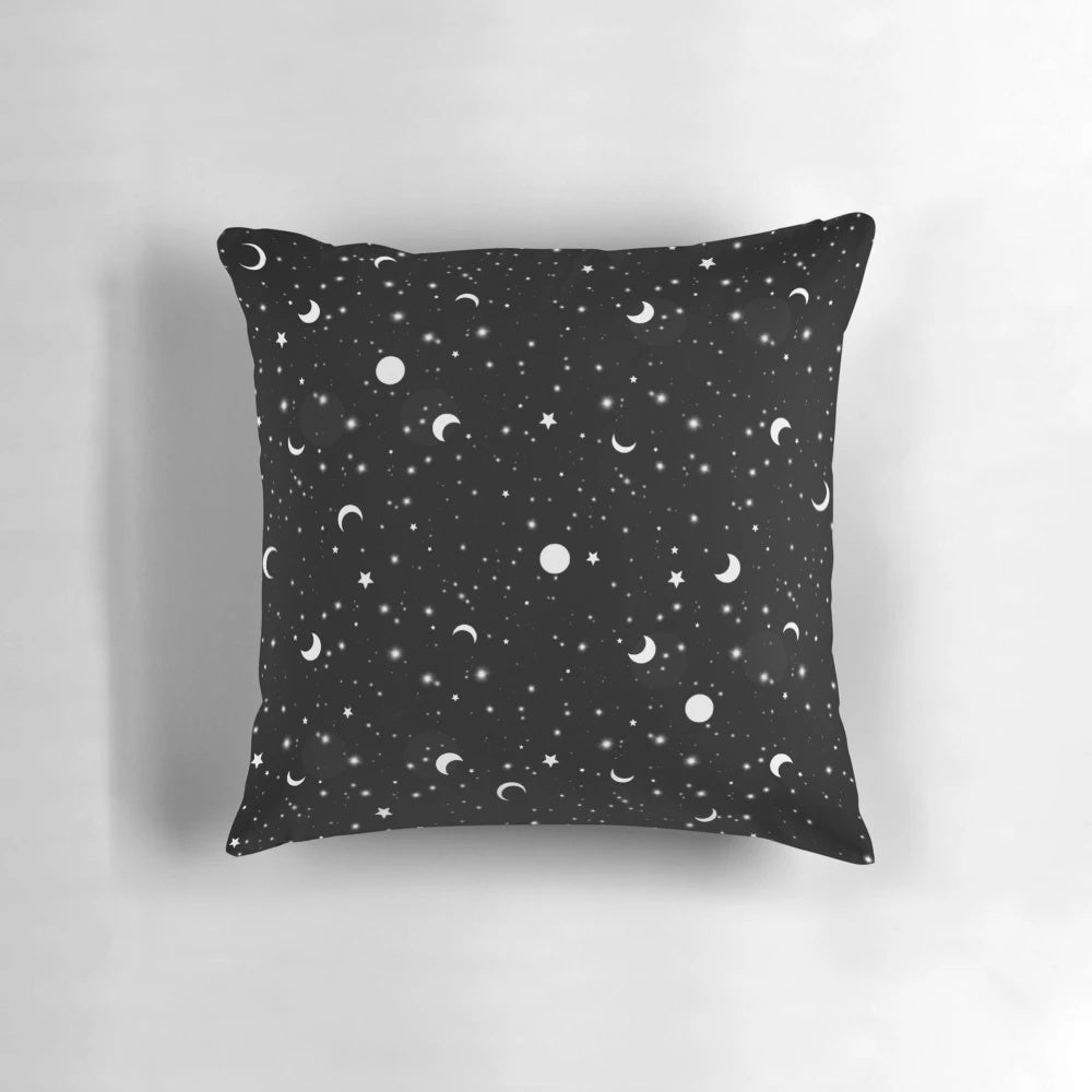 A black pillow with a detailed galaxy, moon, and star pattern for a celestial and mystical look.