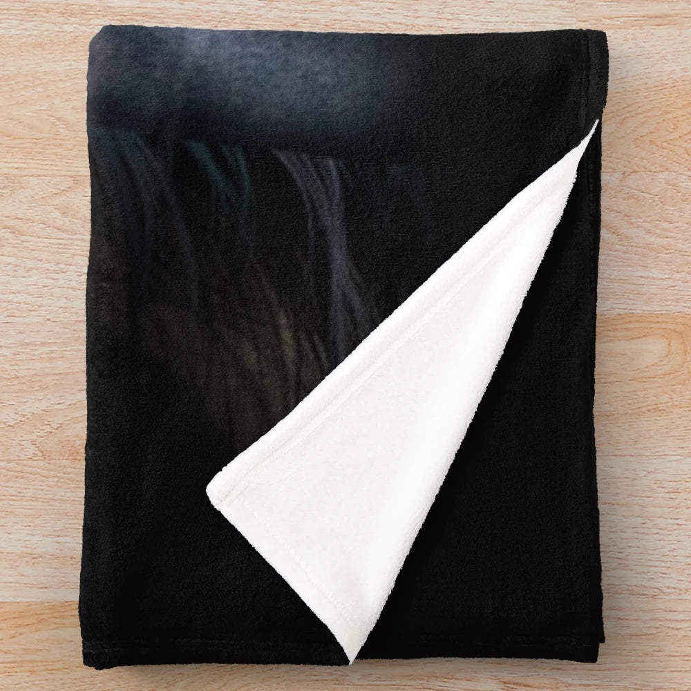 Soft and plush black horse blanket for cozy comfort