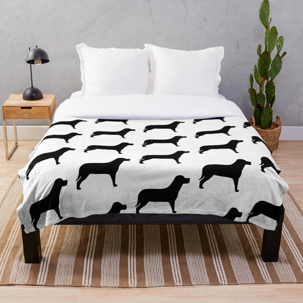 A black labrador inspired plush blanket with a silhouette design