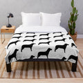 A black labrador inspired plush blanket with a silhouette design