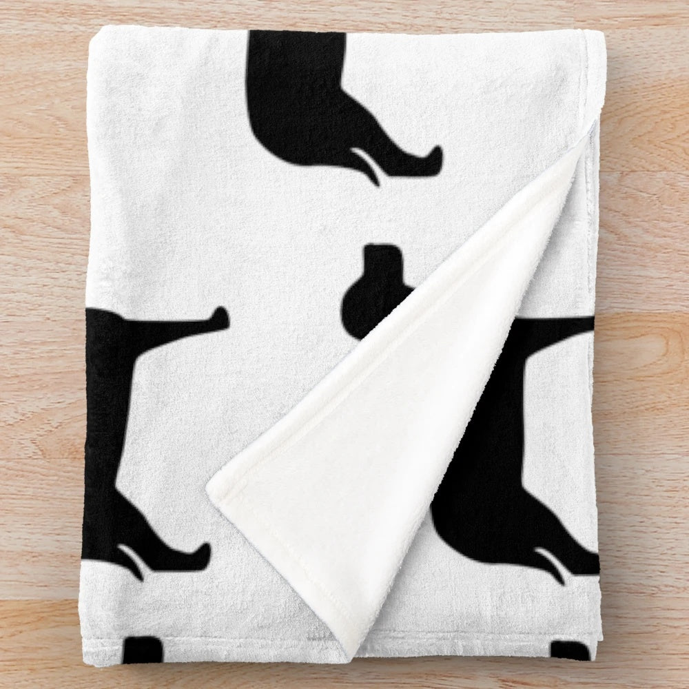 A black labrador inspired plush blanket with a silhouette design