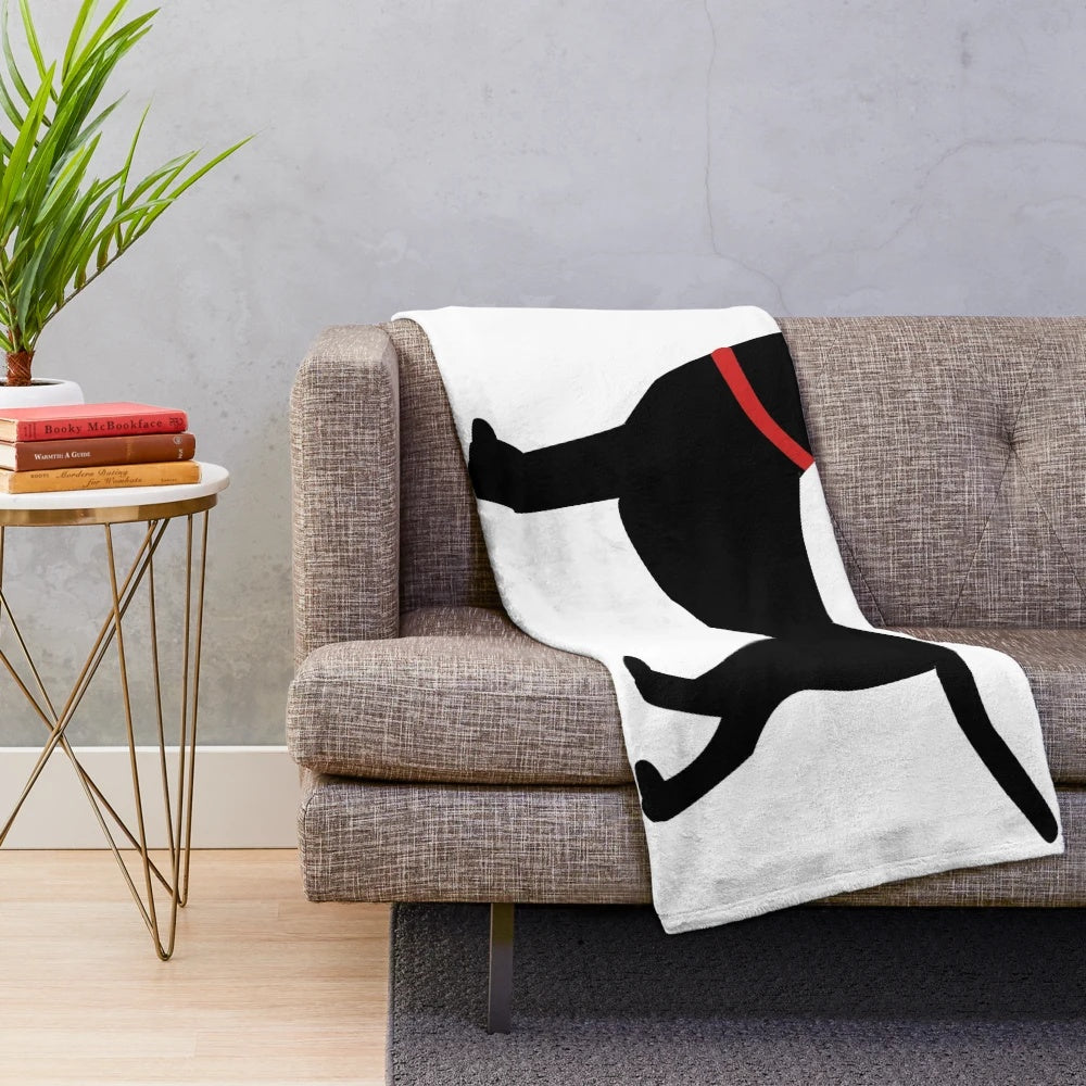 Soft plush blanket featuring a black labrador retriever with a red collar