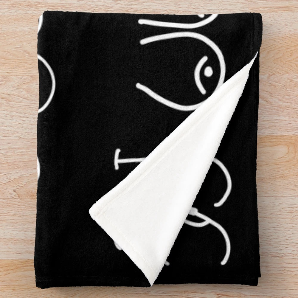 Cozy black plush blanket with a pastel pattern design