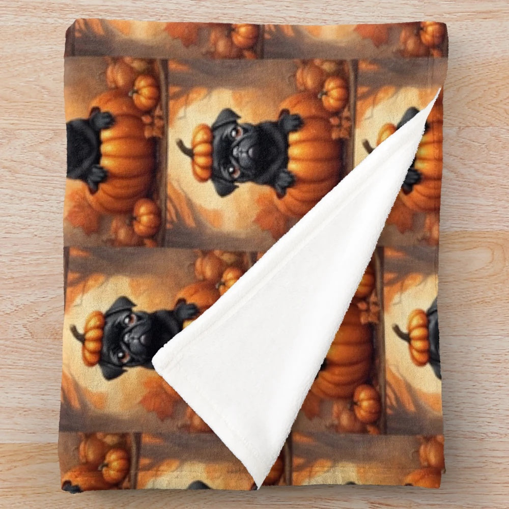 A black pug plush blanket with autumn pumpkin patch design