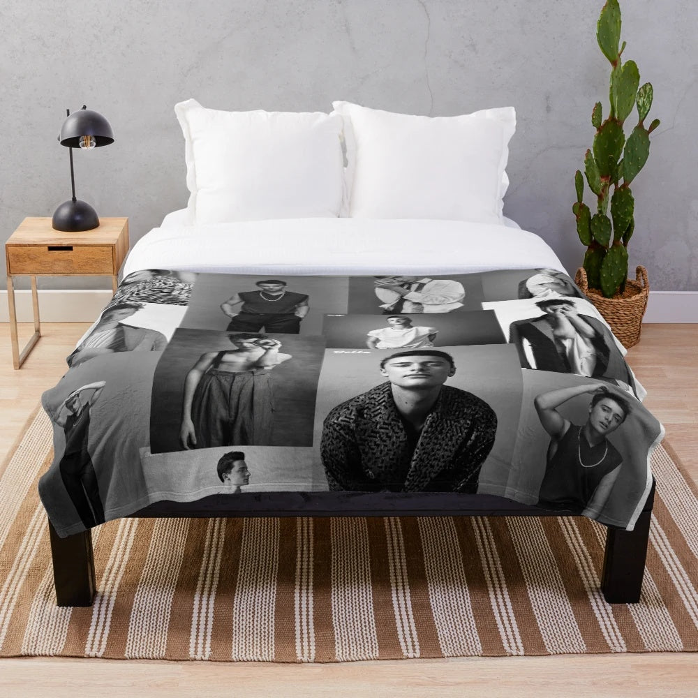 Soft and plush black and white blanket featuring a collage of Noah Schnapp from Stranger Things