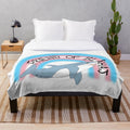 Soft and snuggly plush blanket featuring the iconic IKEA Blahaj shark design in trans pride colors