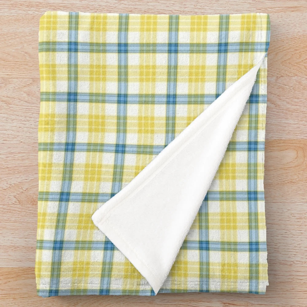 Blue and yellow plaid plush blanket with McGrath tartan-inspired design