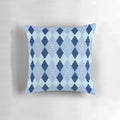 Blue argyle patterned pillow with a diamond design
