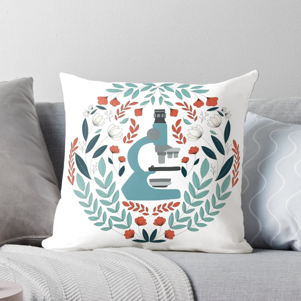 Blue and white folk-style pillow with a microscope design, perfect for science lovers.