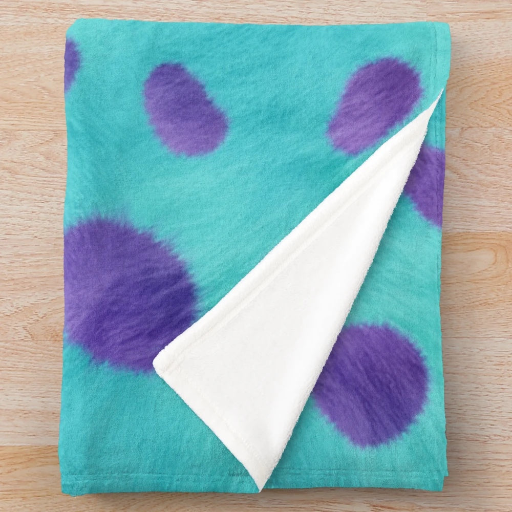 Soft and fluffy blue monster-inspired plush blanket