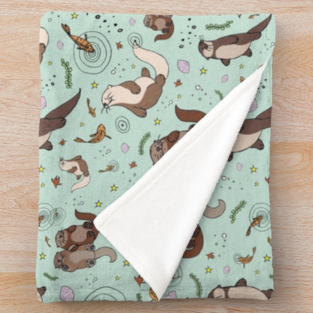 Blue otter plush blanket