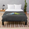 Blue parakeet plush blanket with cute bird design