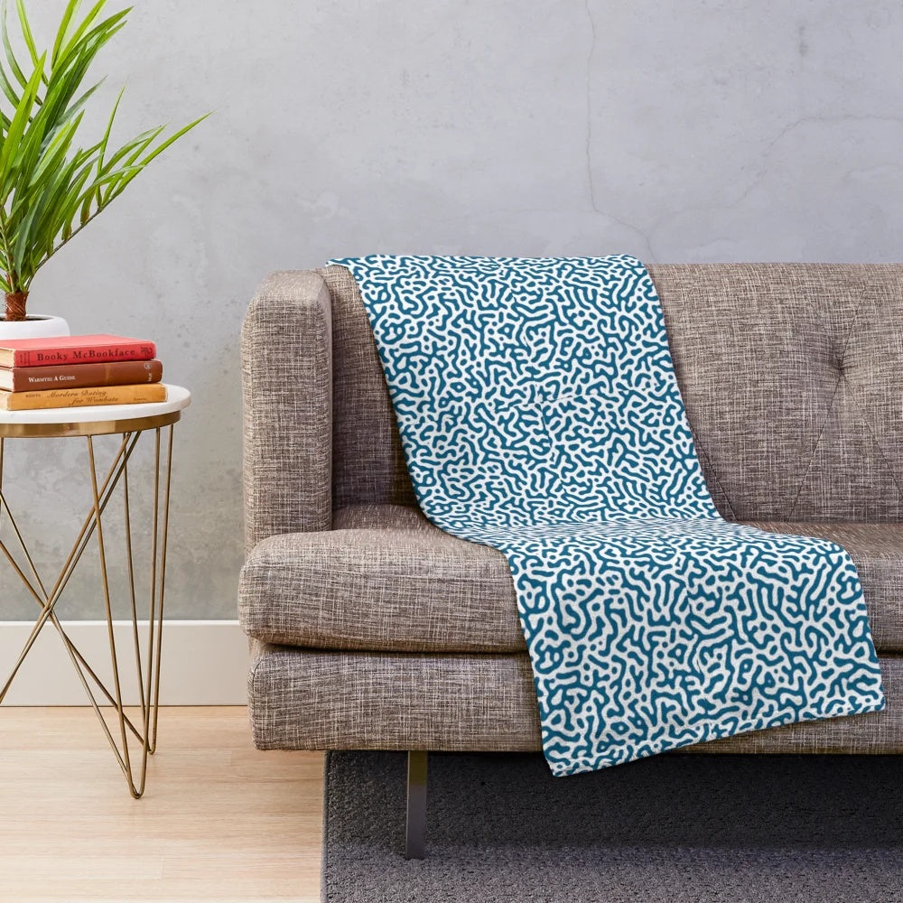 Soft, textured blue patterned plush blanket for home decor
