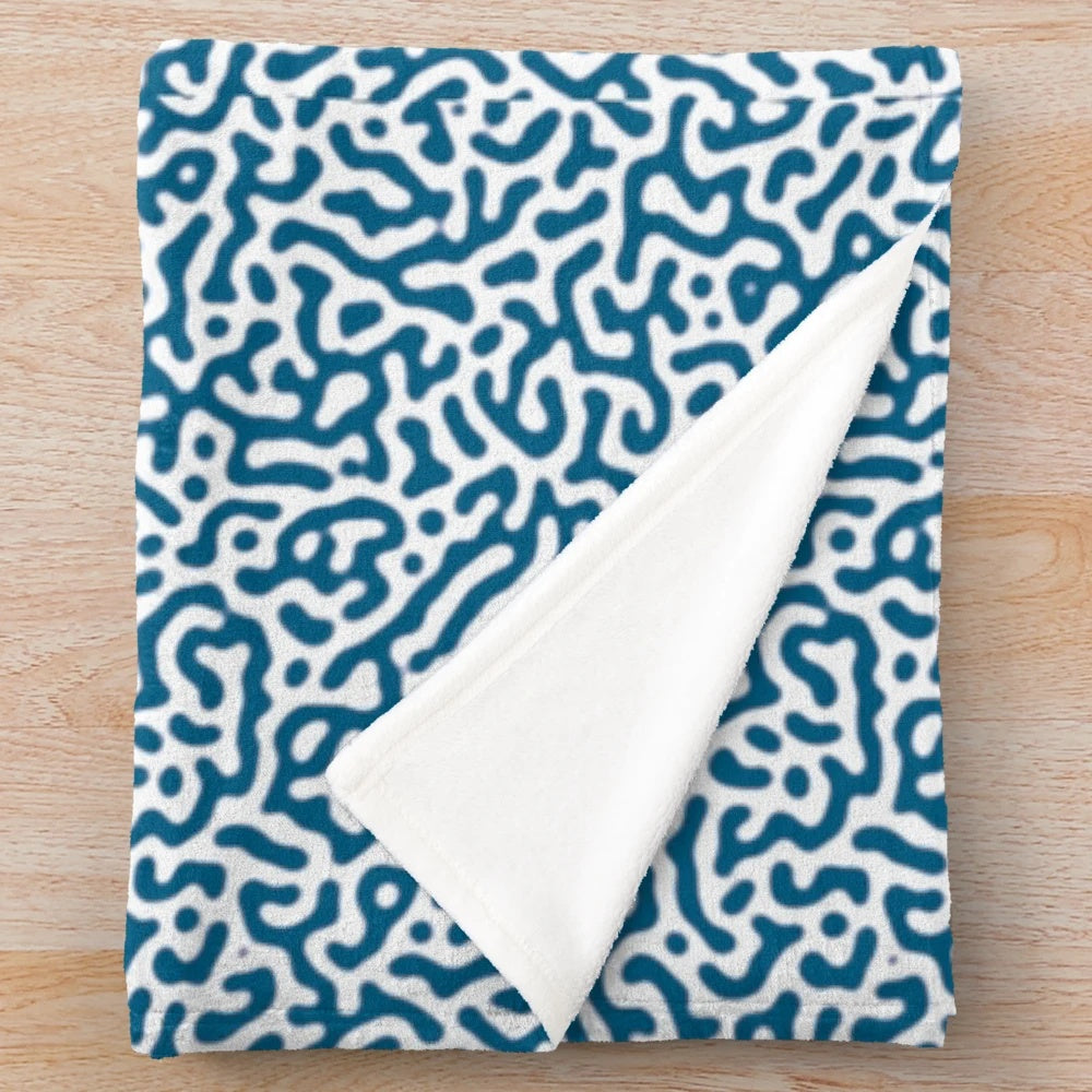 Soft, textured blue patterned plush blanket for home decor