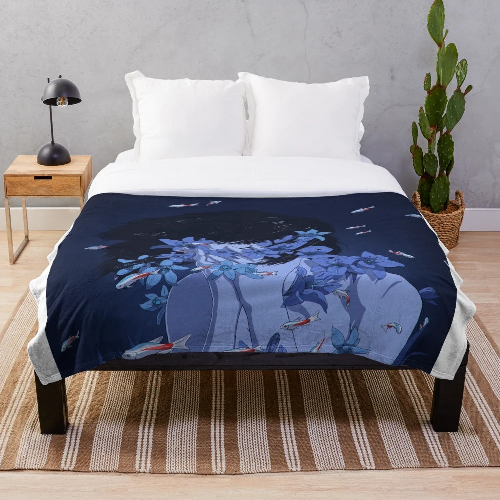 Blue plush blanket with anime-inspired design