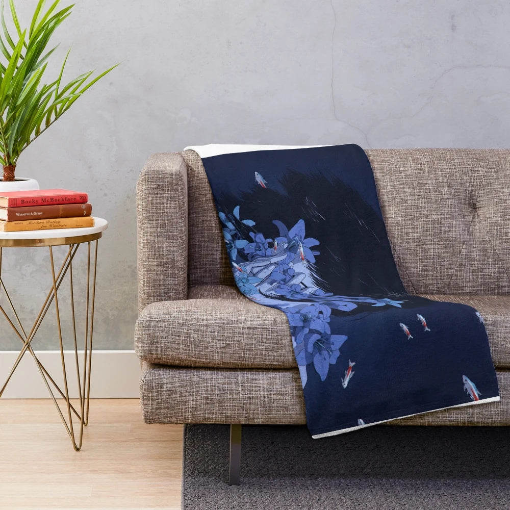 Blue plush blanket with anime-inspired design