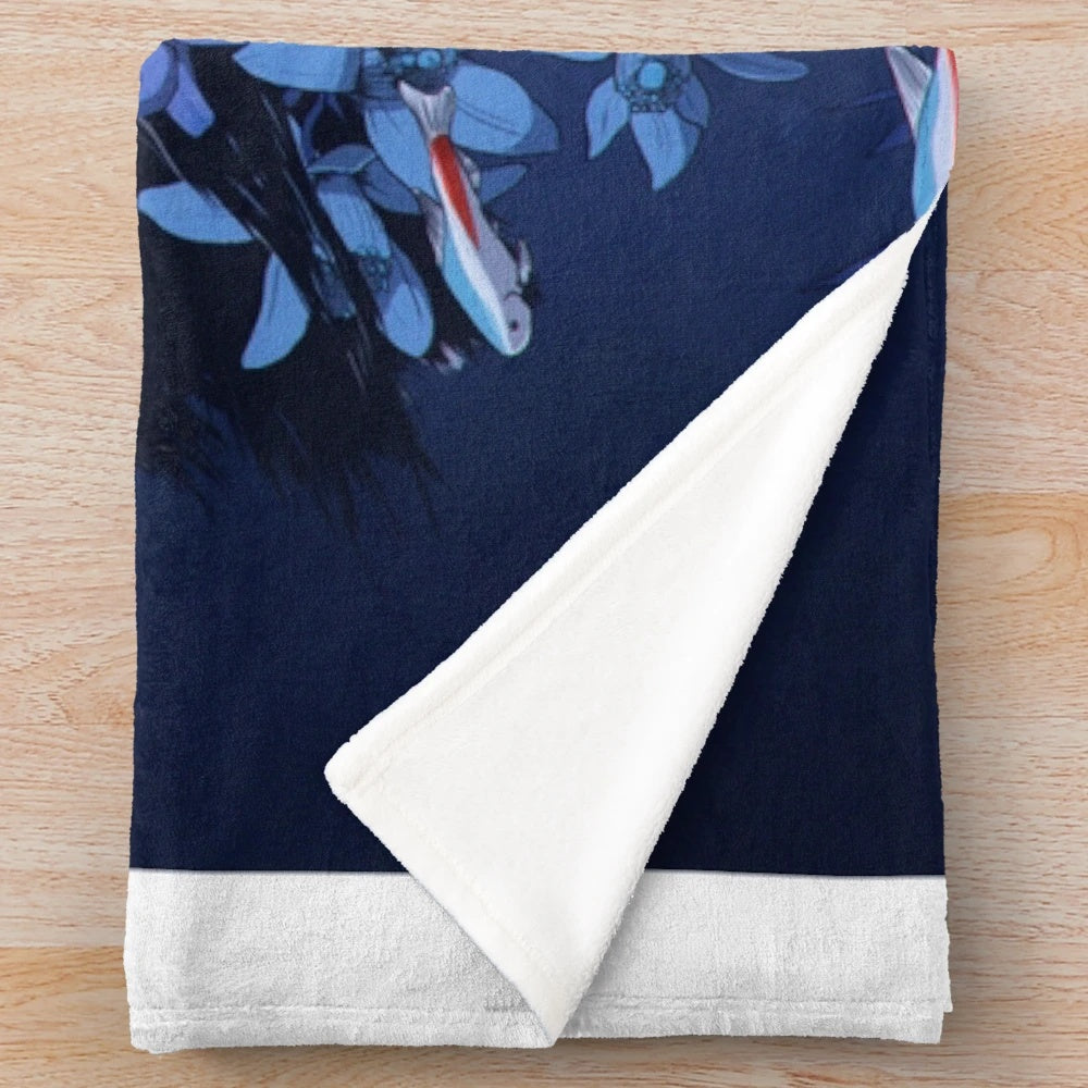 Blue plush blanket with anime-inspired design