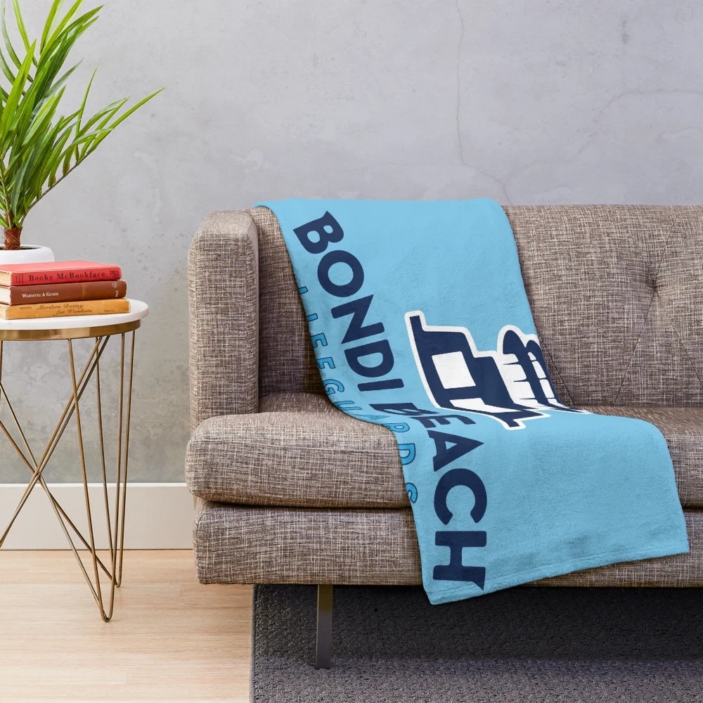 Blue plush blanket with Bondi Beach lifeguard theme