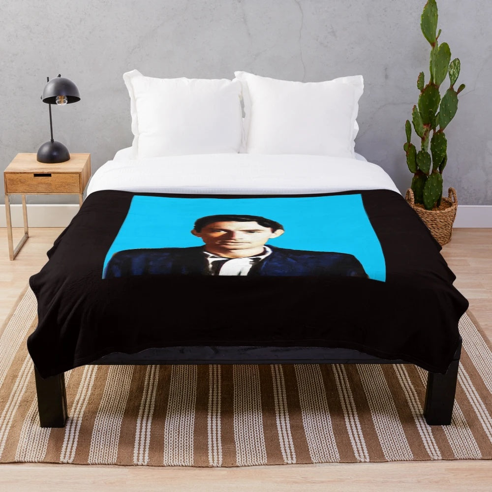 Blue plush blanket featuring a vintage-inspired Gregory Peck design
