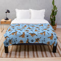 Blue plush blanket with a German Shepherd print design