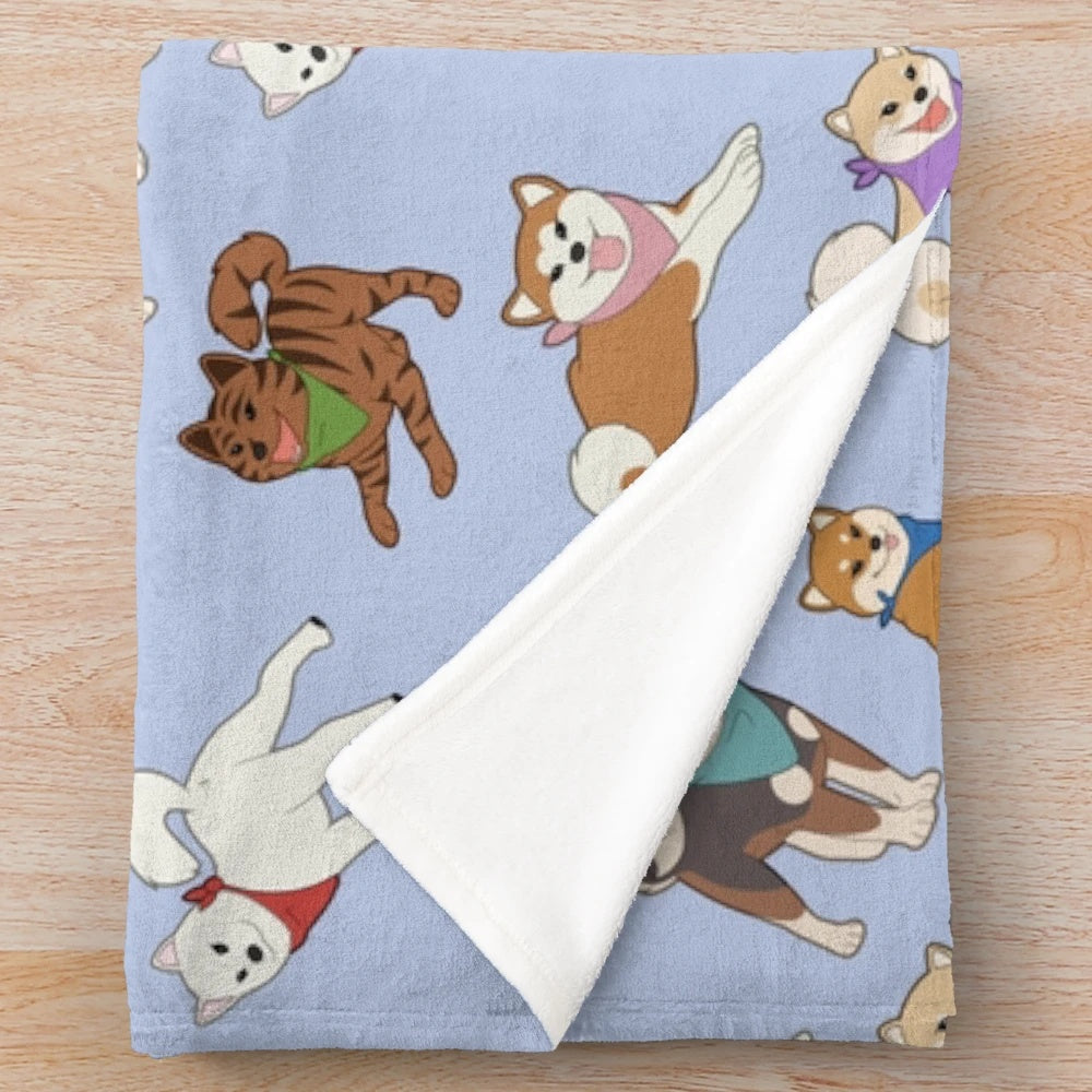Blue plush blanket featuring a design inspired by Japanese dog breeds