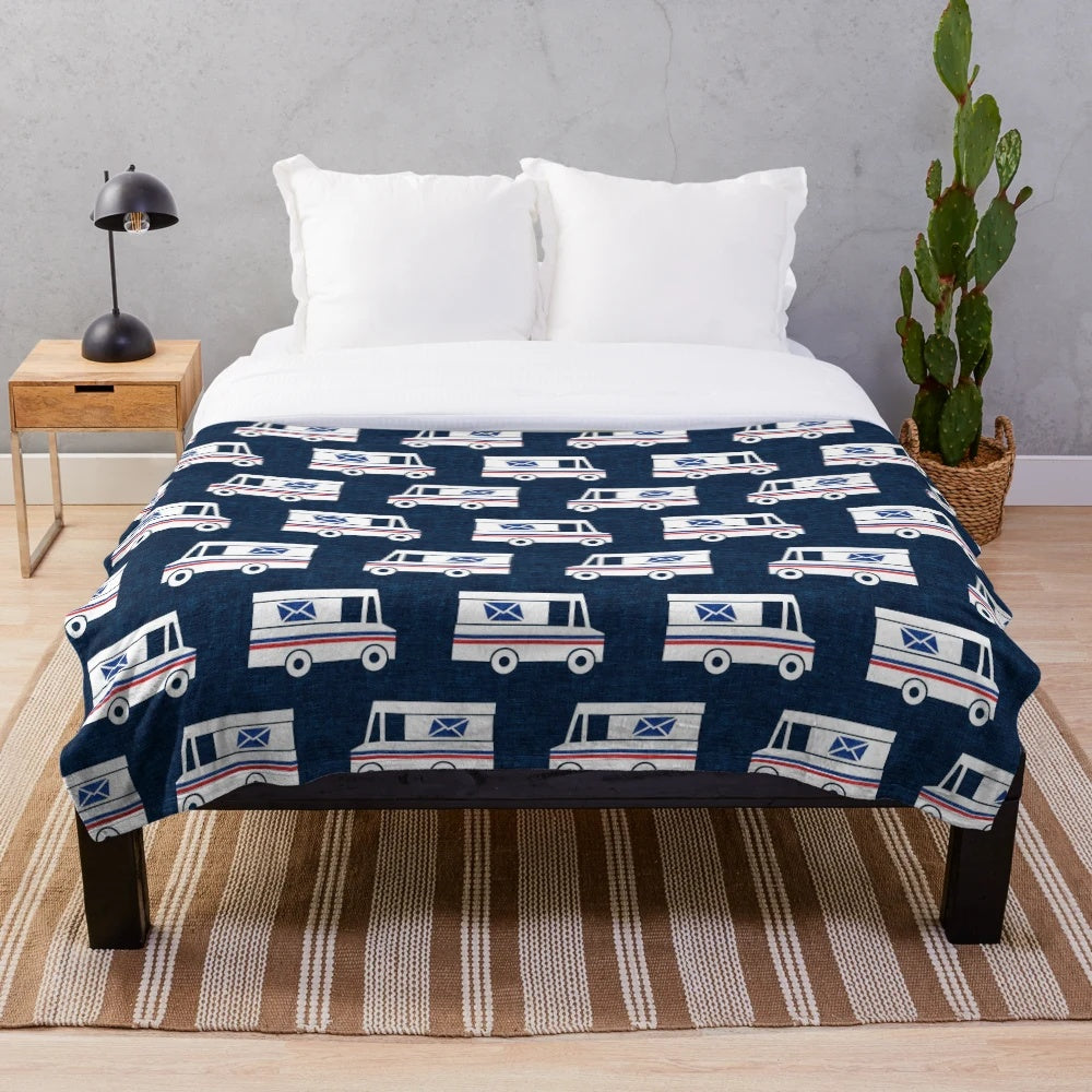 Blue plush blanket with mail truck and mail service design