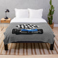 Blue race car plush blanket with checkered flag design