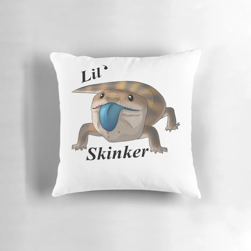 A decorative throw pillow featuring a playful blue tongue skink design, perfect for adding a touch of nature-inspired style to your home.