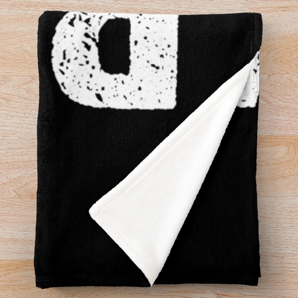 Plush blanket featuring a BMX-inspired design for cycling enthusiasts