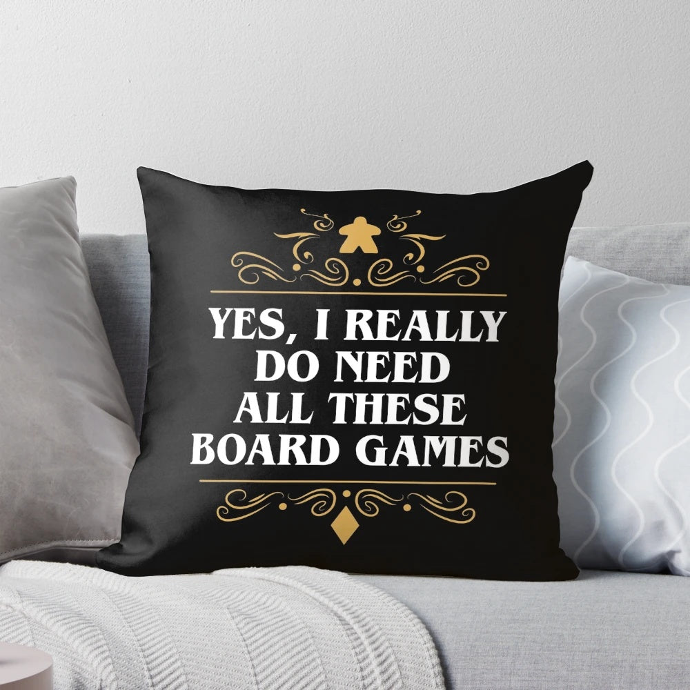 A plush throw pillow featuring various board game components and designs, perfect for game enthusiasts and nerdy home decor.