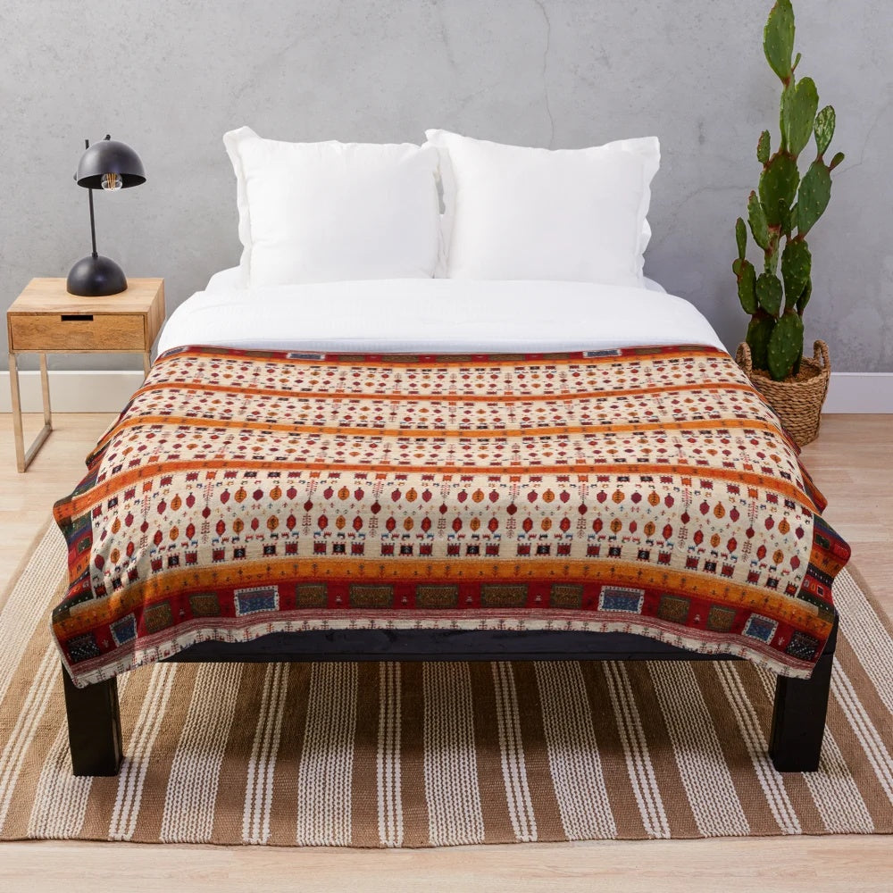 Bohemian-inspired plush blanket in Moroccan-style pattern
